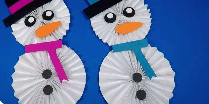 Hvordan lage en snømann med hendene ut av papir